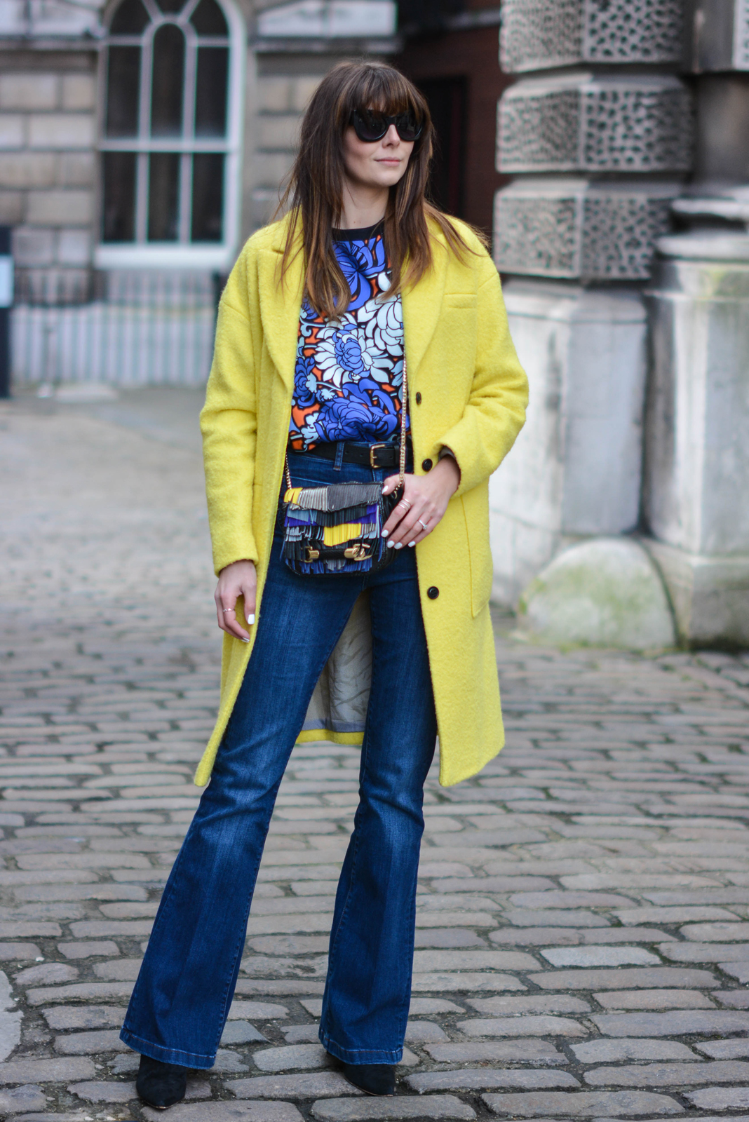 EJSTYLE - Emma Hill, London Fashion Week, LFW AW15, LFW FW15, Street style, Topshop 70's top, Flare jeans, Yellow coat, OOTD, Topshop print blouse, Jimmy choo fringe bag