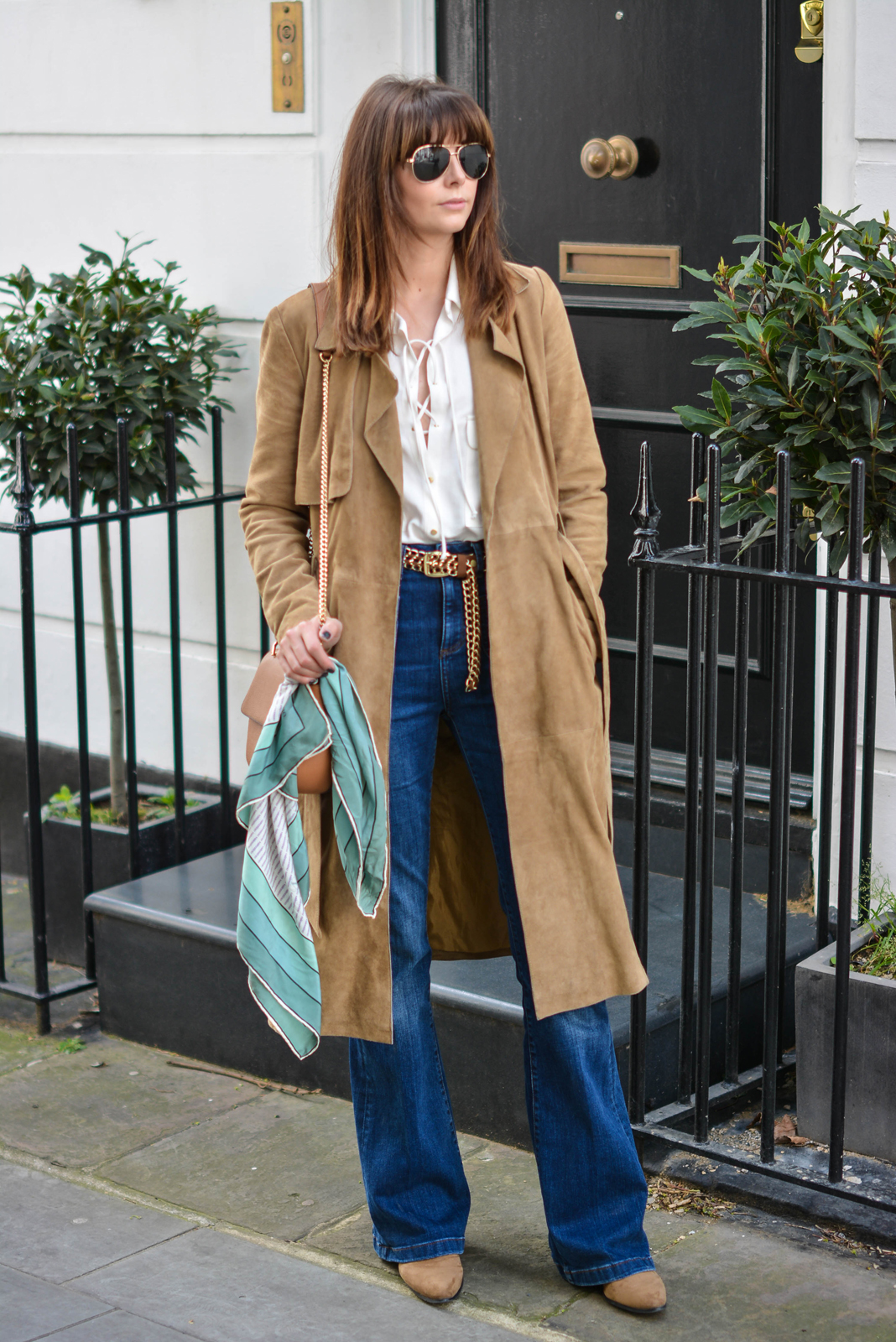 EJSTYLE - Suede trench coat by Gestuz, Zara lace up shirt, M&S High waisted flare jeans, tan chain belt, gold aviator sunglasses, Chloe drew dupe bag, Vintage valentino scarf, tan ankle boots, 70s street style