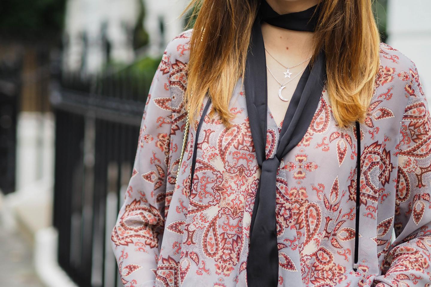 EJSTYLE wears paisley print top, skinny fringe scarf, 70s outfit details