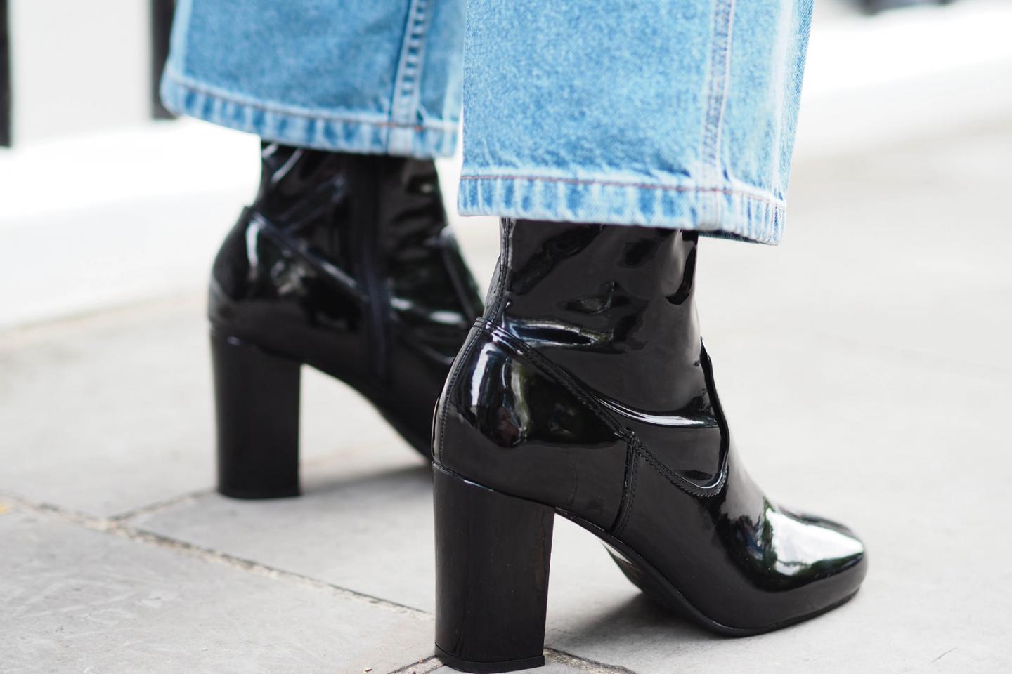 EJSTYLE wears wide leg cropped Topshop jeans, Black patent River Island gogo block heel ankle boots