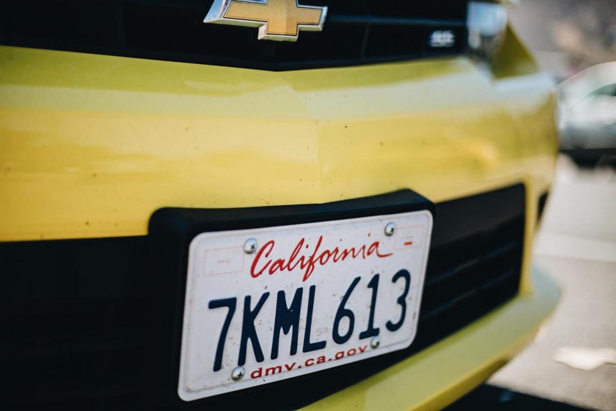 California license plate, yellow camera car