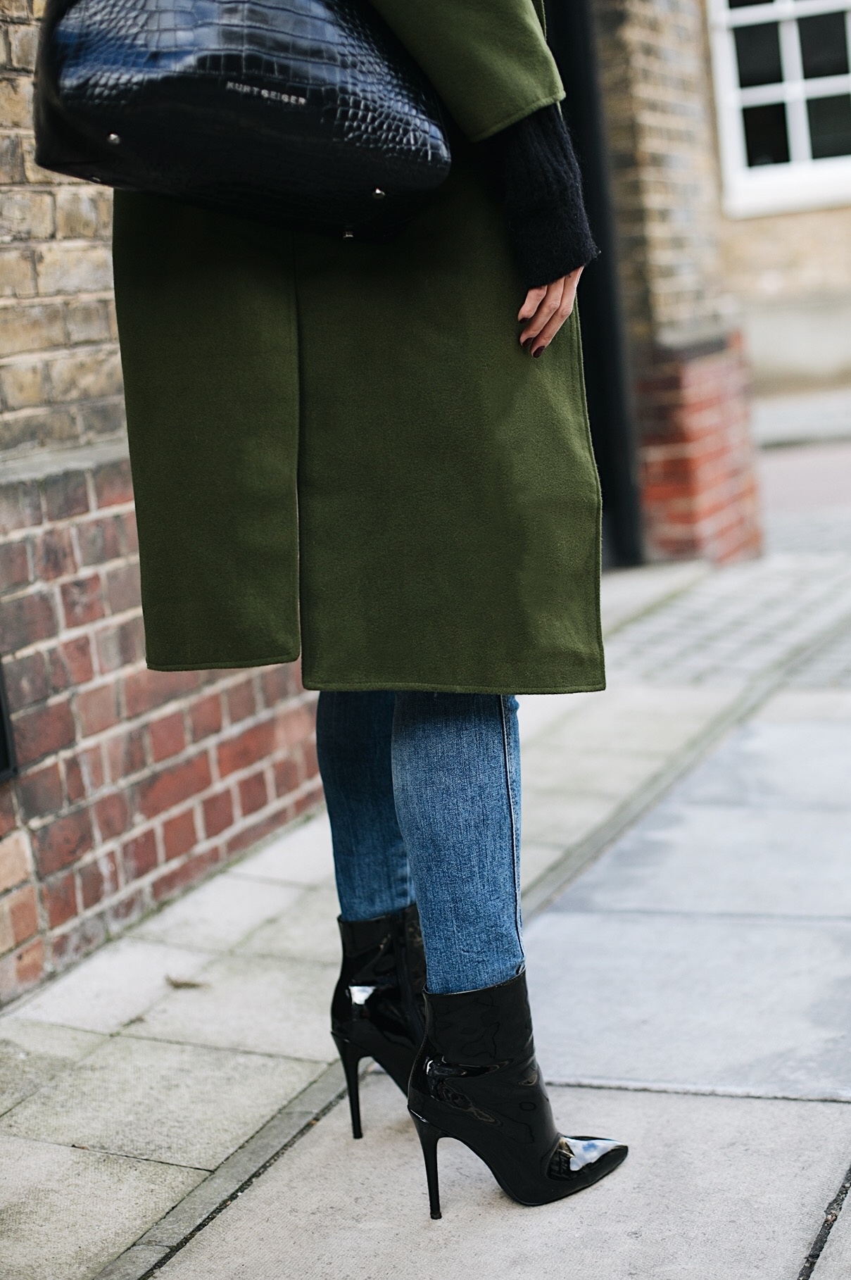 khaki coat, skinny jeans, black patent vinyl pvc heeled ankle boots