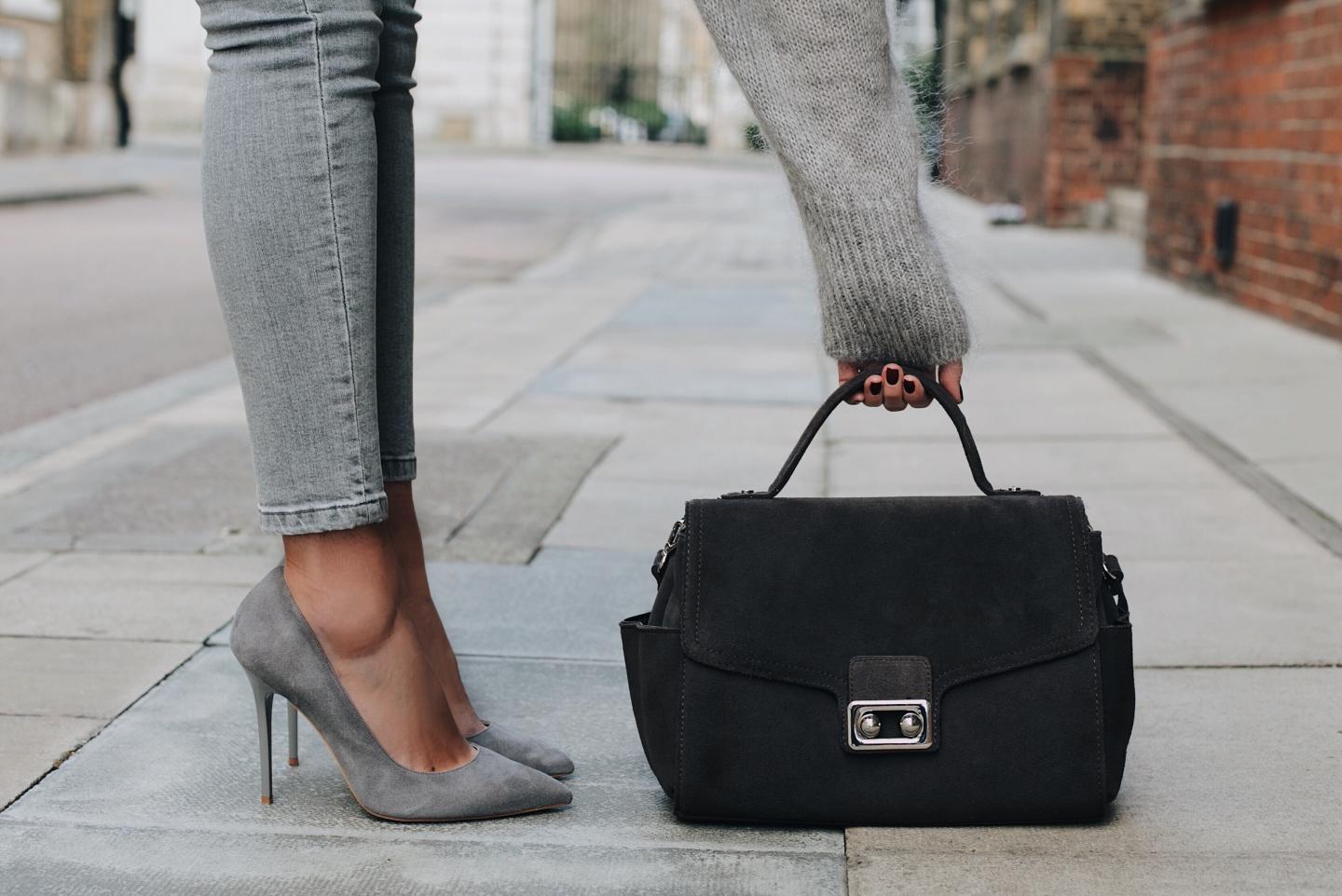 Grey suede pumps, grey skinny jeans, grey fluffy sweater, grey suede bag, grey outfit details