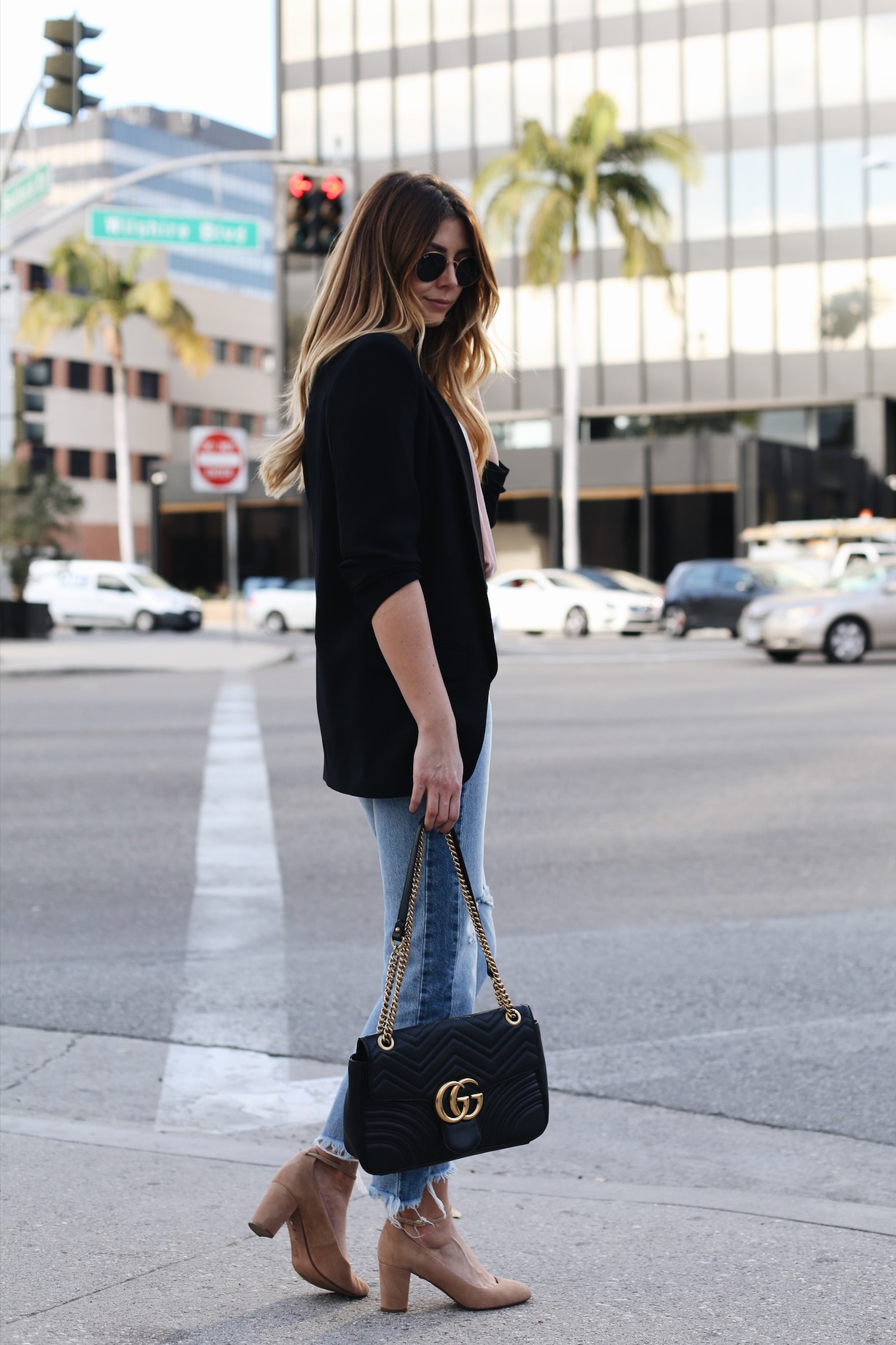 Emma Hill wears pink velvet came top, black blazer, ripped hem frayed jeans, Gucci Marmont bag, beige suede mid heels Emma Hill wears pink velvet came top, black blazer, ripped hem frayed jeans, Gucci Marmont bag, beige suede mid heels