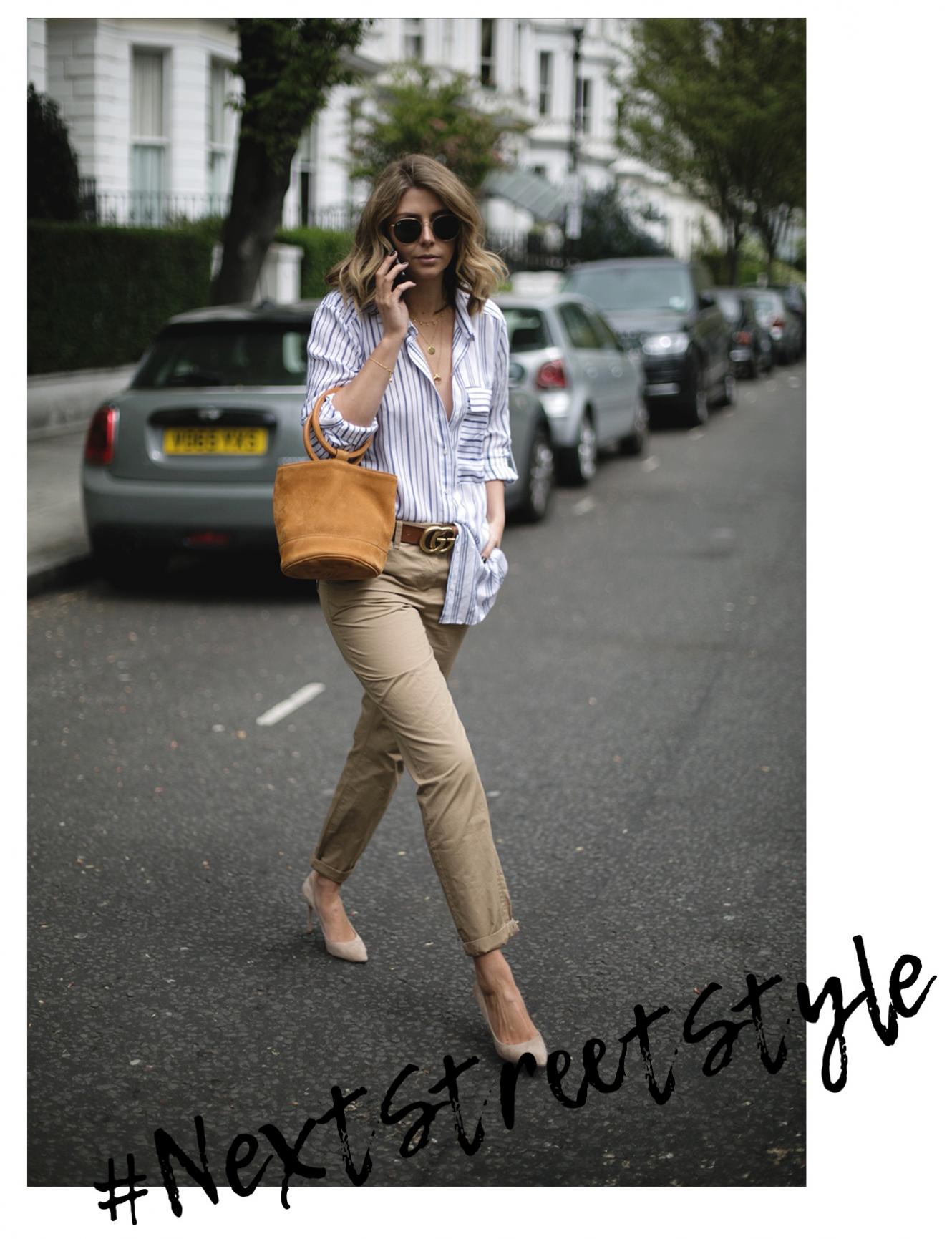 Emma Hill wears stripe shirt, tan suede Simon Miller bag, chinos, suede pumps, street style photography