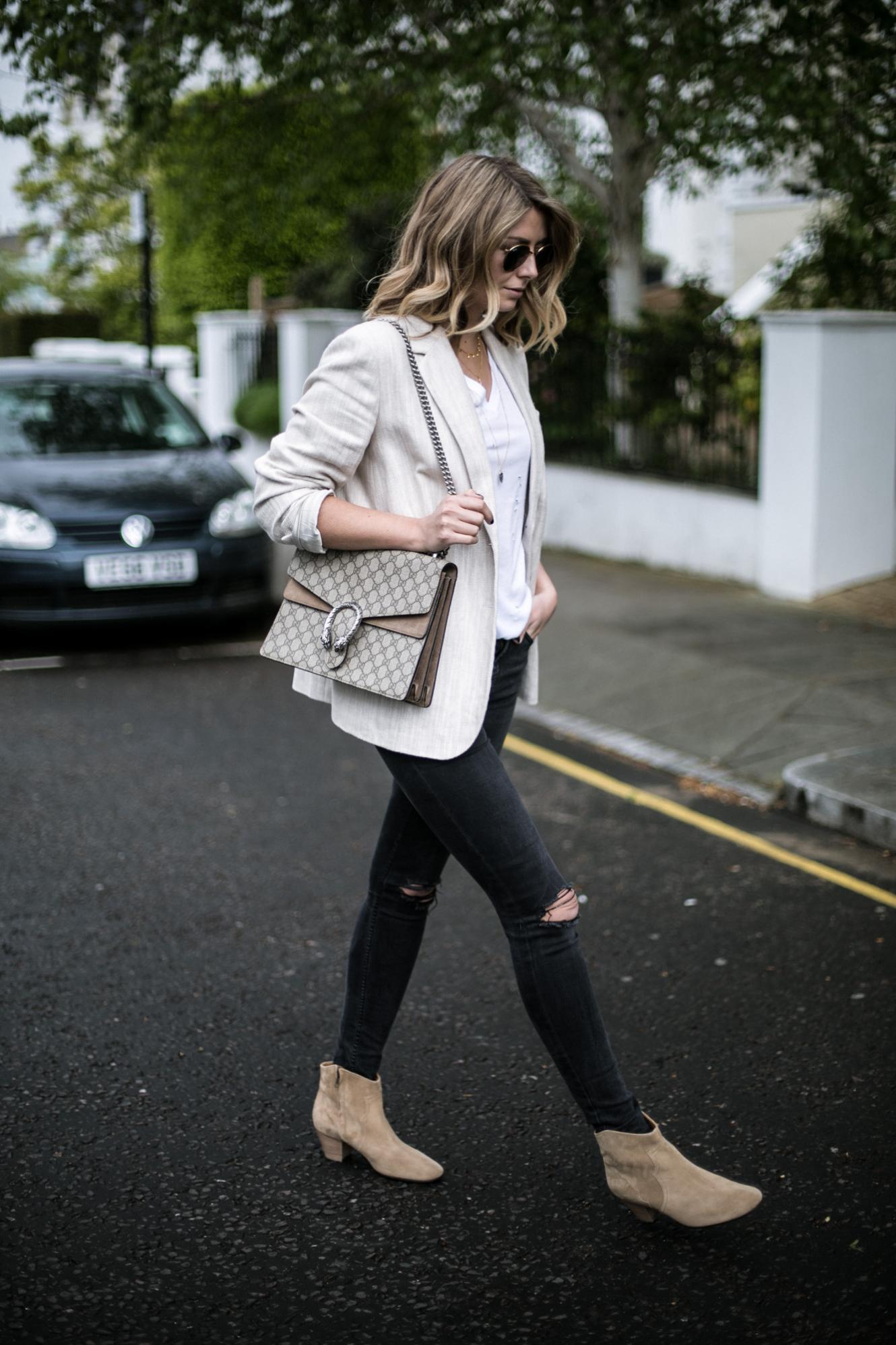 Emma Hill of EJSTYLE wears beige linen blazer, white t-shirt, Gucci Dionysus bag, black skinny jeans ripped knees, beige suede Isabel marant dicker boots, chic Spring outfit