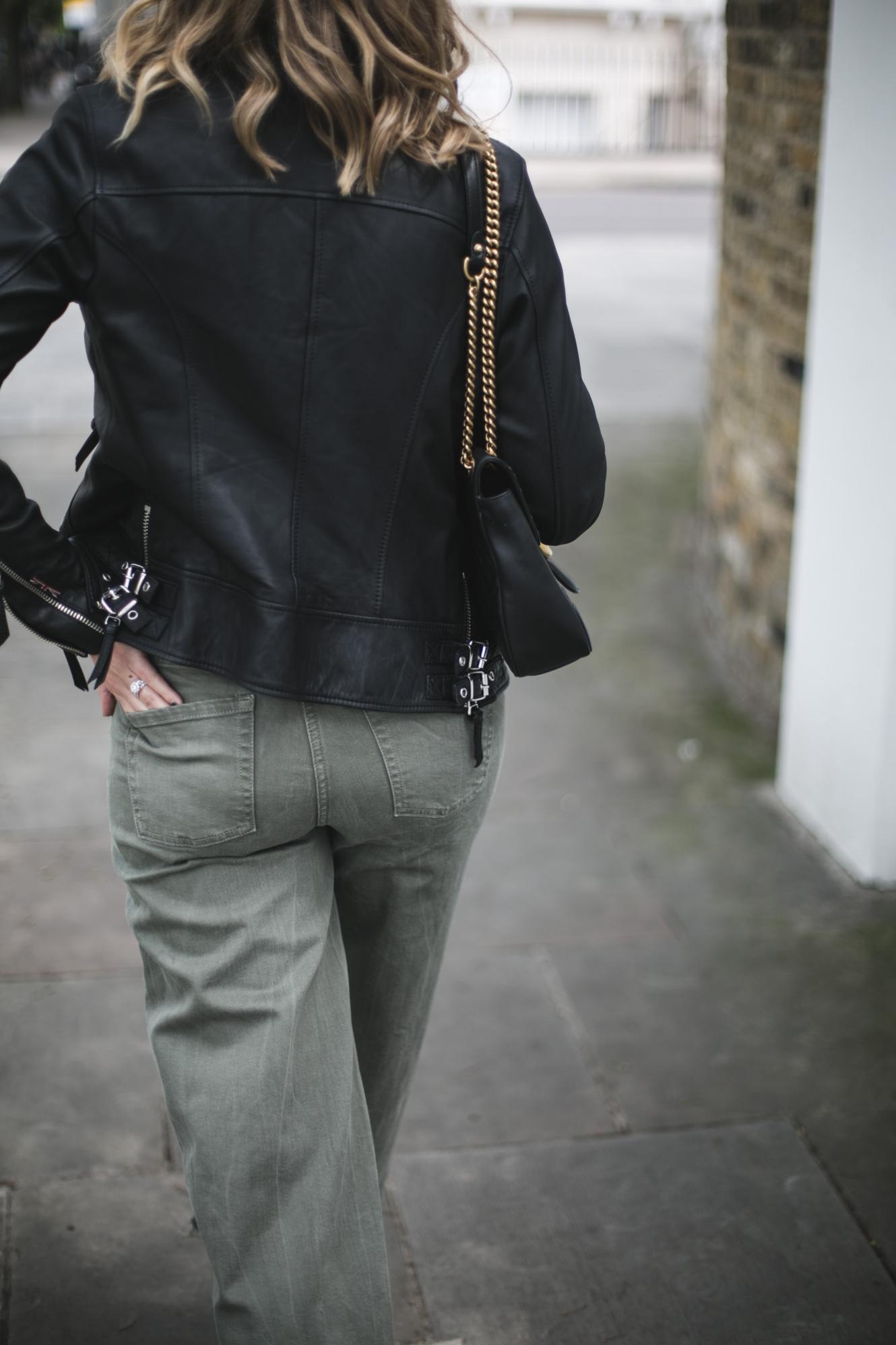 biker jacket, Gucci marmot, khaki wide leg jeans biker jacket, Gucci marmot, khaki wide leg jeans