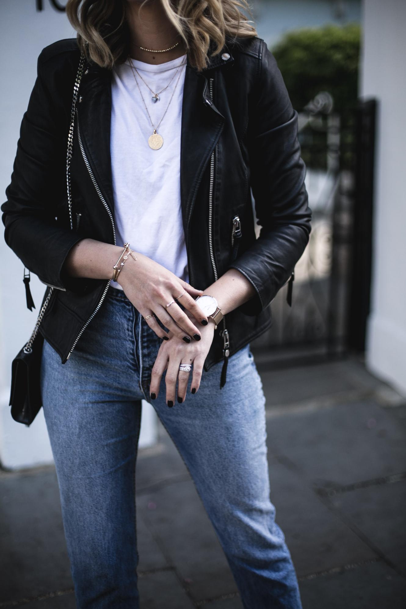 Young, Handsome Guy in a White T-shirt, Black, Leather Jacket and Blue,  Torn Jeans is on the Street, Model, City Walk Stock Photo - Image of  fashion, background: 143064574