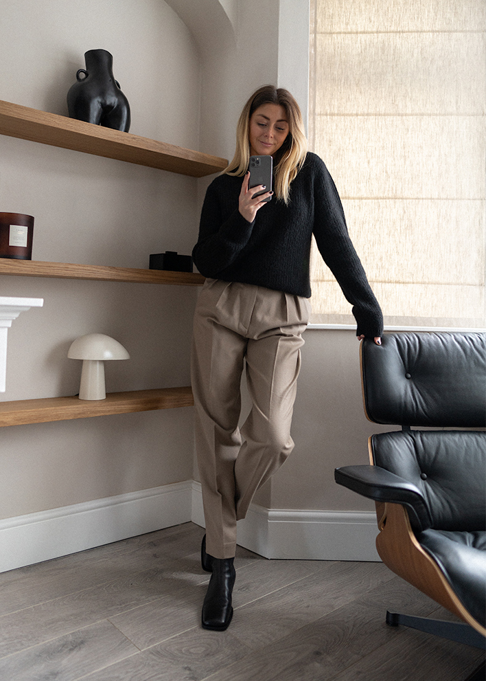Emma Hill style. Black alpaca jumper, taupe tailored trousers, black square toe boots Emma Hill style. Black alpaca jumper, taupe tailored trousers, black square toe boots